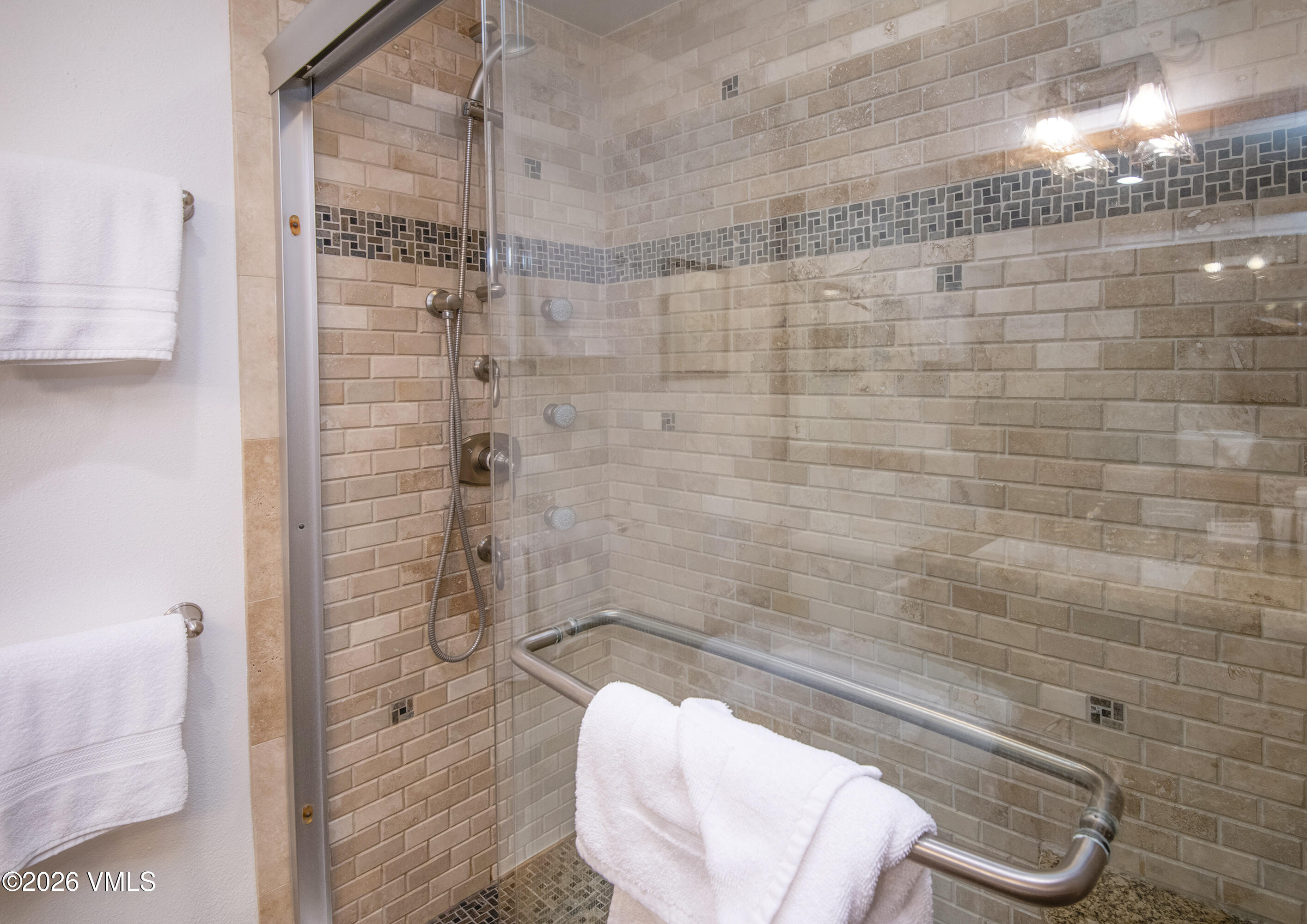 1100 North Frontage Road West, Unit 1519 Vail, CO 81657 - Photo 10 of 38 a bathroom with a shower