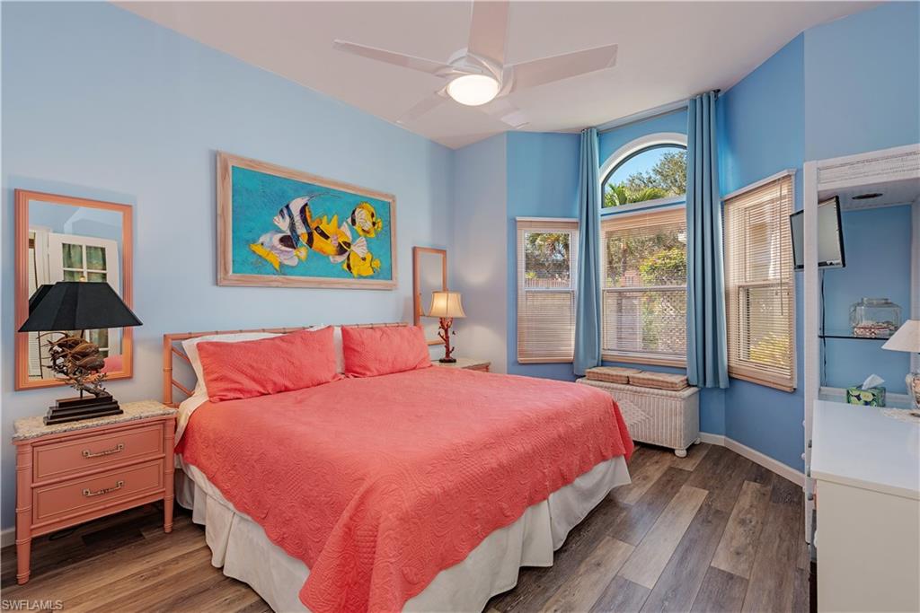 6624 Trident Way, Unit G5 Naples, FL 34108 - Photo 11 of 18 a bedroom with bed and window