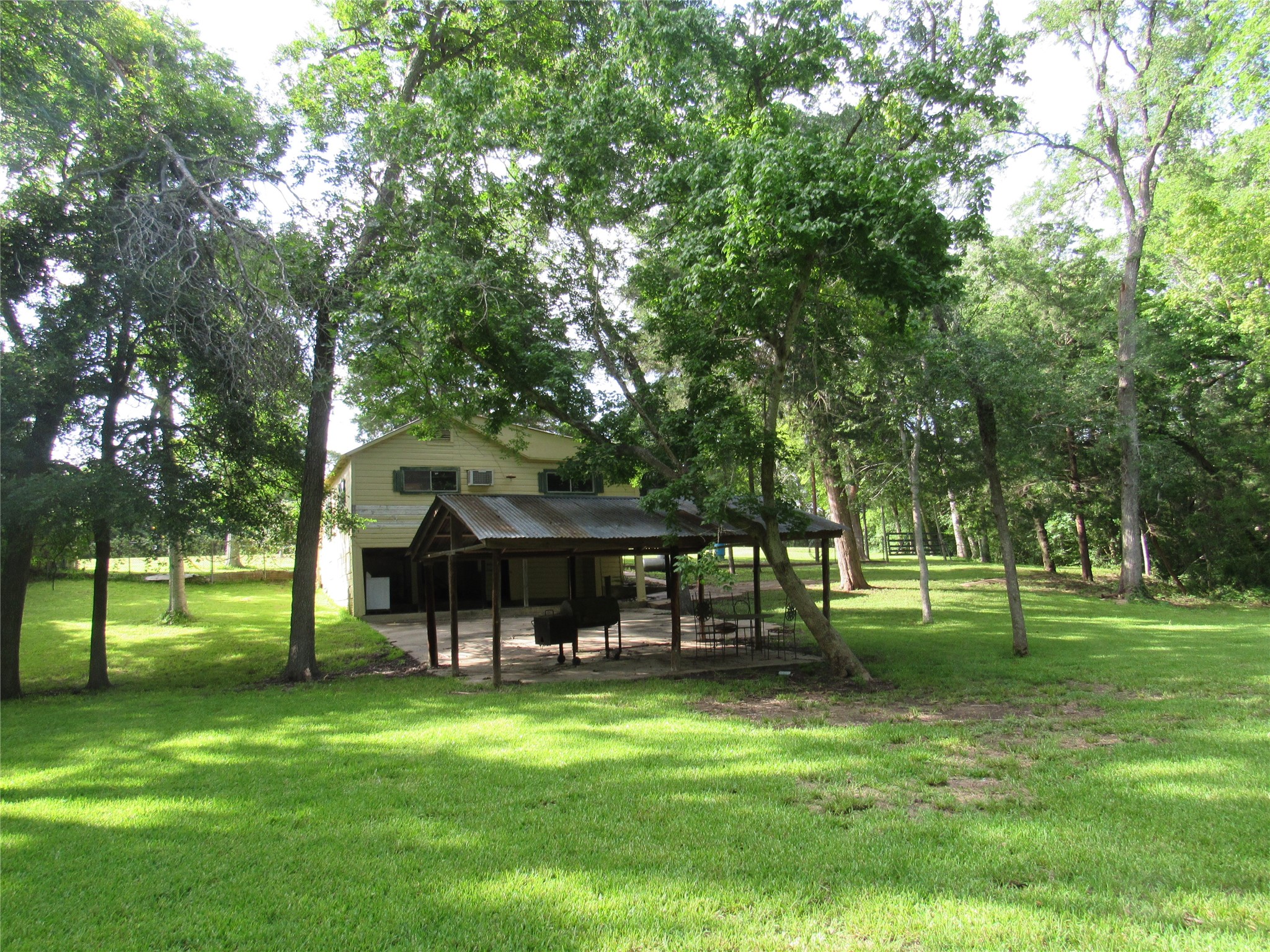9491 Rocky Road Bellville, TX 77418 - Photo 12 of 19 a view of a park with trees and grass