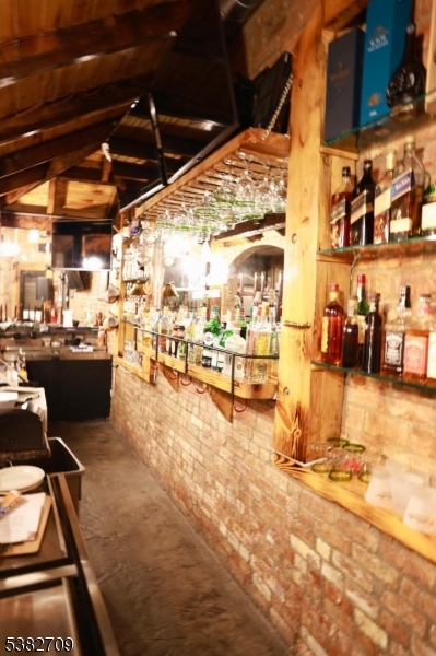 237 Haledon Avenue Haledon, NJ 07508 - Photo 11 of 49 a view of a swimming pool with outdoor seating