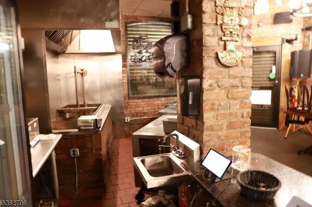 a bathroom with a sink and a shower