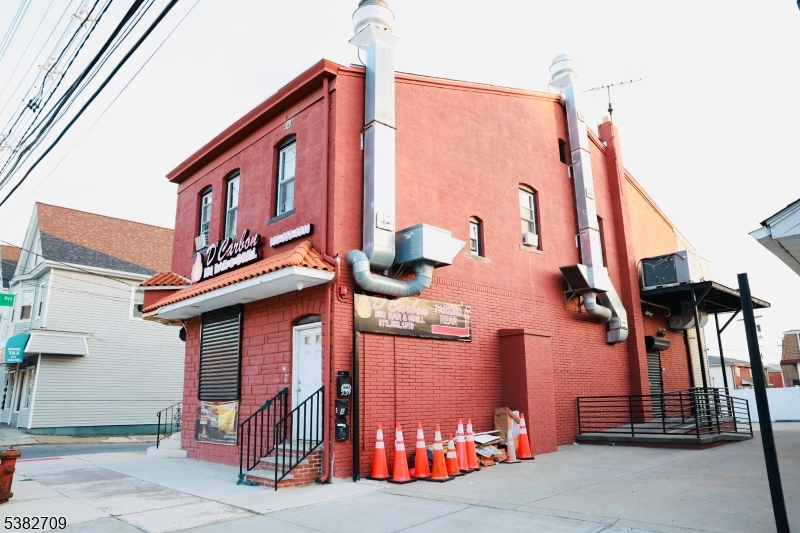 237 Haledon Avenue Haledon, NJ 07508 - Photo 2 of 49 a view of a house with a street