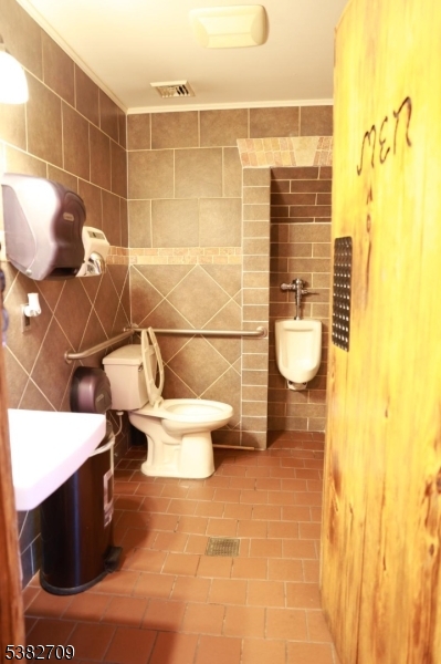 237 Haledon Avenue Haledon, NJ 07508 - Photo 21 of 49 a bathroom with a toilet and a shower