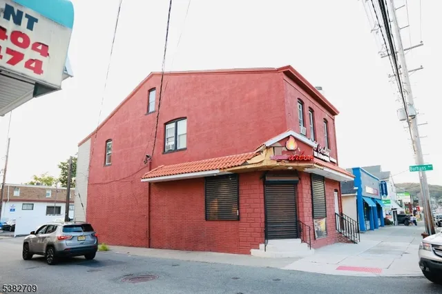 a car parked in front of a house