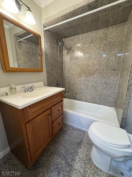 237 Haledon Avenue Haledon, NJ 07508 - Photo 37 of 49 a bathroom with a sink a toilet and shower