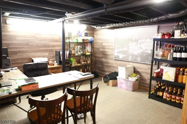 a outdoor dining space with furniture and a potted plant