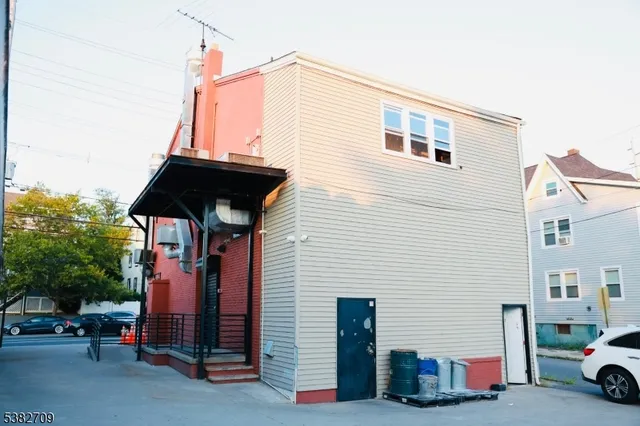 a car parked in front of a house
