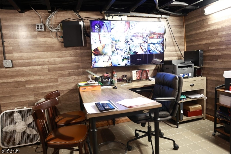 237 Haledon Avenue Haledon, NJ 07508 - Photo 41 of 49 a view of a workspace with furniture