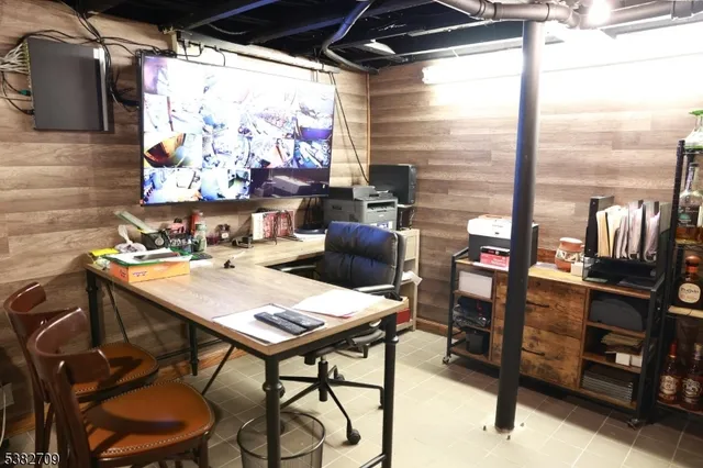 a outdoor dining space with furniture and umbrella