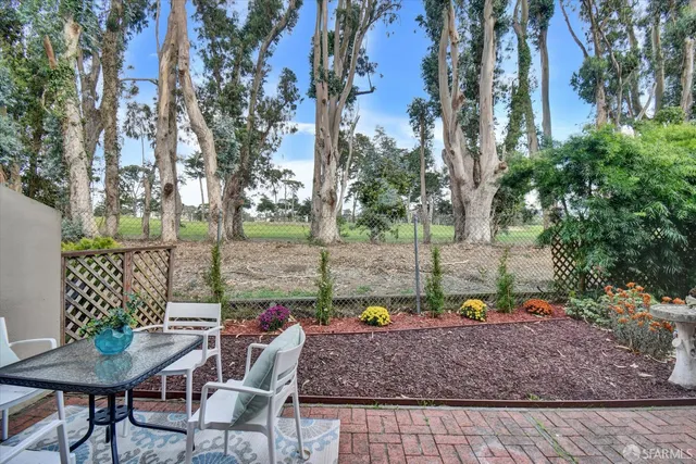 a bathroom with a sink mirror and toilet