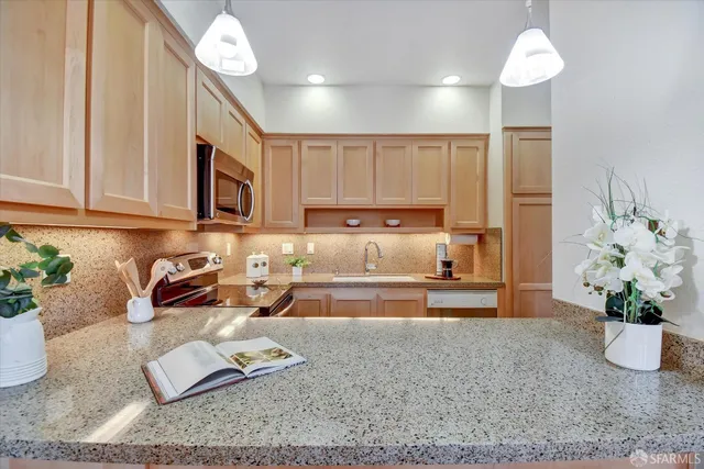a bathroom with a sink vanity and a mirror