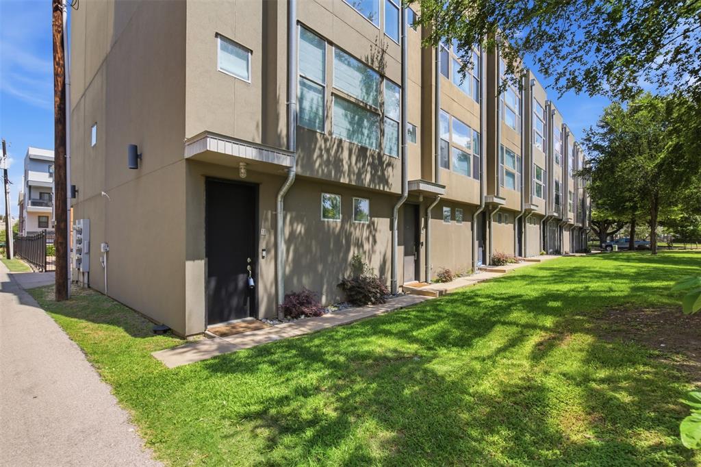 2111 Clark Street, Unit H Dallas, TX 75204 - Photo 25 of 37 a view of a building with a yard