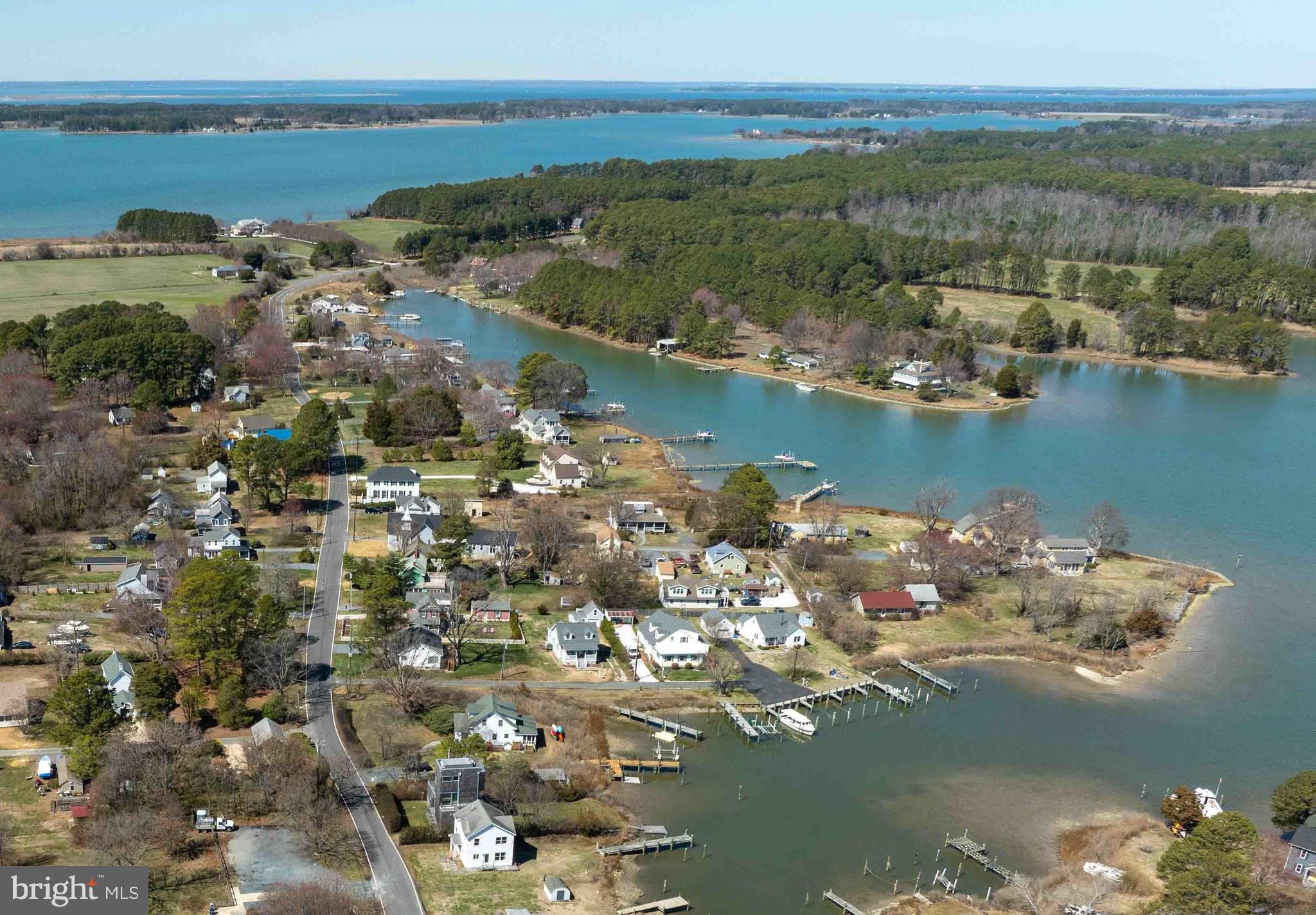 a view of a lake with lots of residential buildings