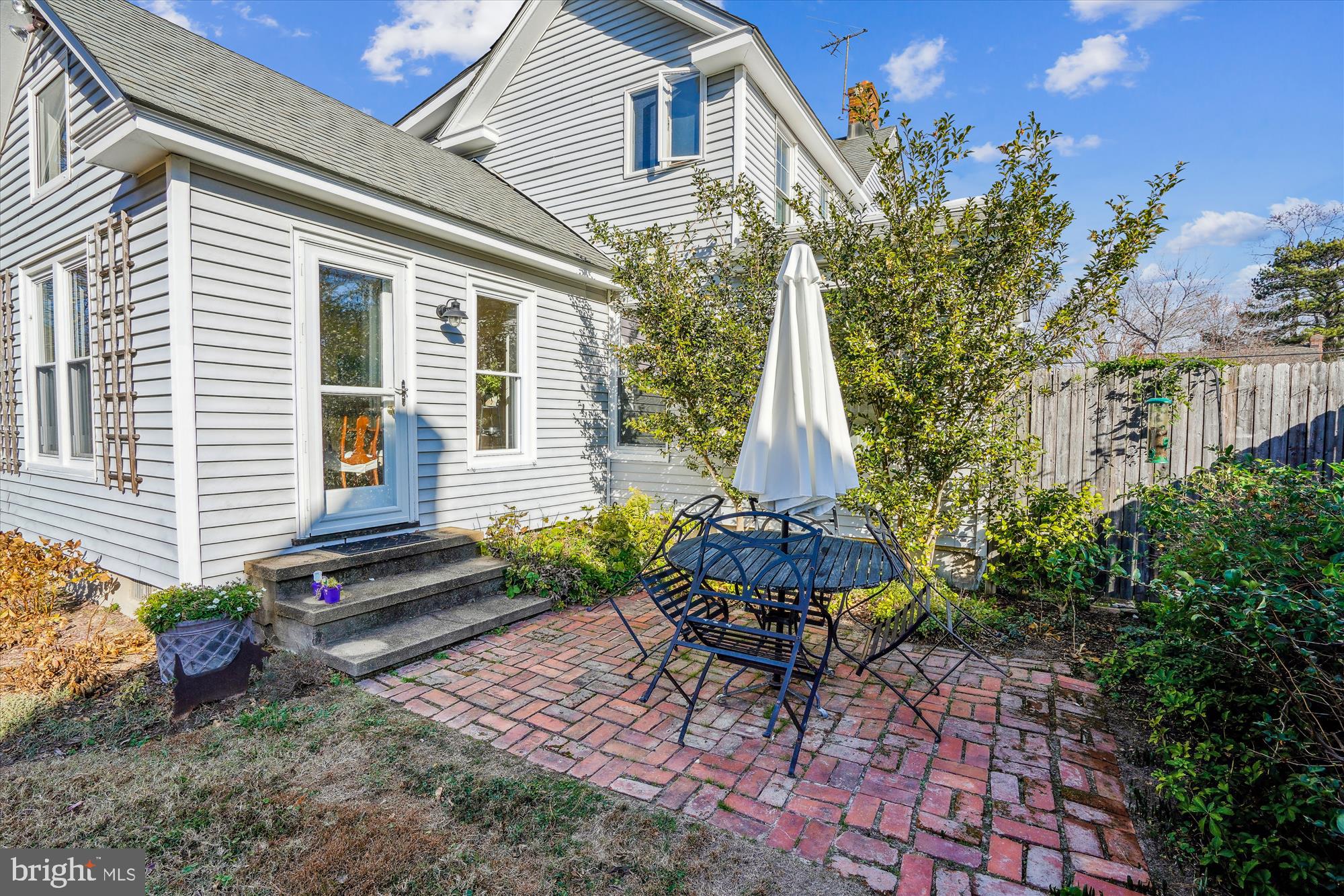 6394 Bozman Neavitt Road Neavitt, MD 21652 - Photo 28 of 30 Patio with huge camellias, dozens of bulbs.