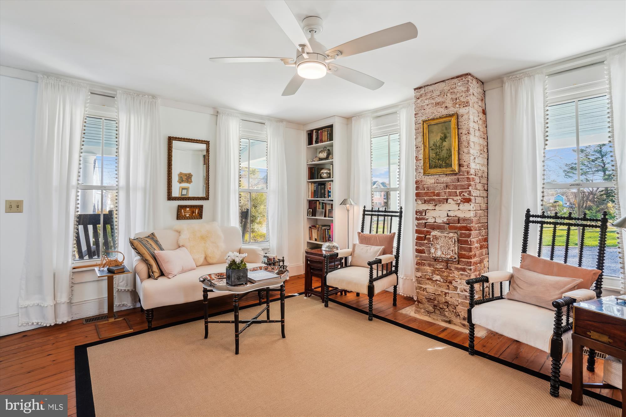 6394 Bozman Neavitt Road Neavitt, MD 21652 - Photo 4 of 26 a living room with furniture and a floor to ceiling window