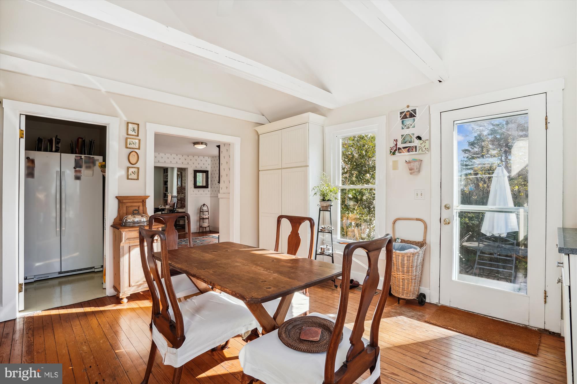 6394 Bozman Neavitt Road Neavitt, MD 21652 - Photo 9 of 26 a view of a dining room with furniture window and wooden floor