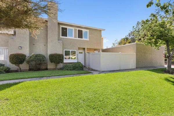 a house view with a garden space