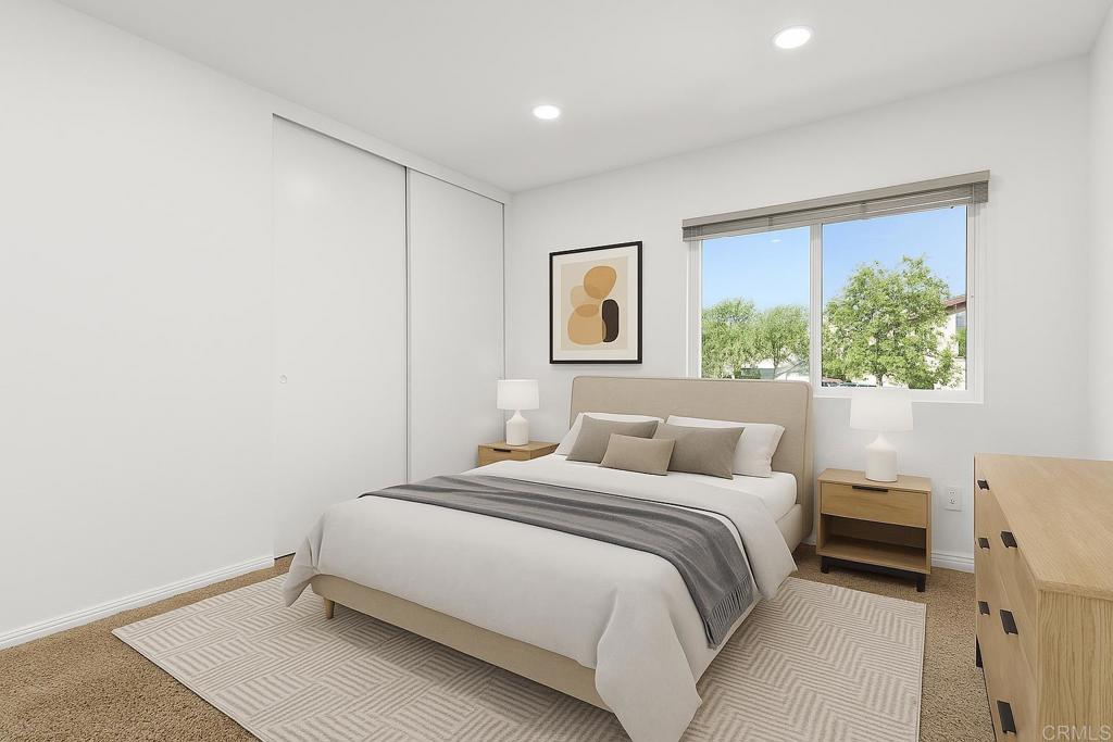 13544 Comuna Drive Poway, CA 92064 - Photo 21 of 41 a bedroom with a bed and a window