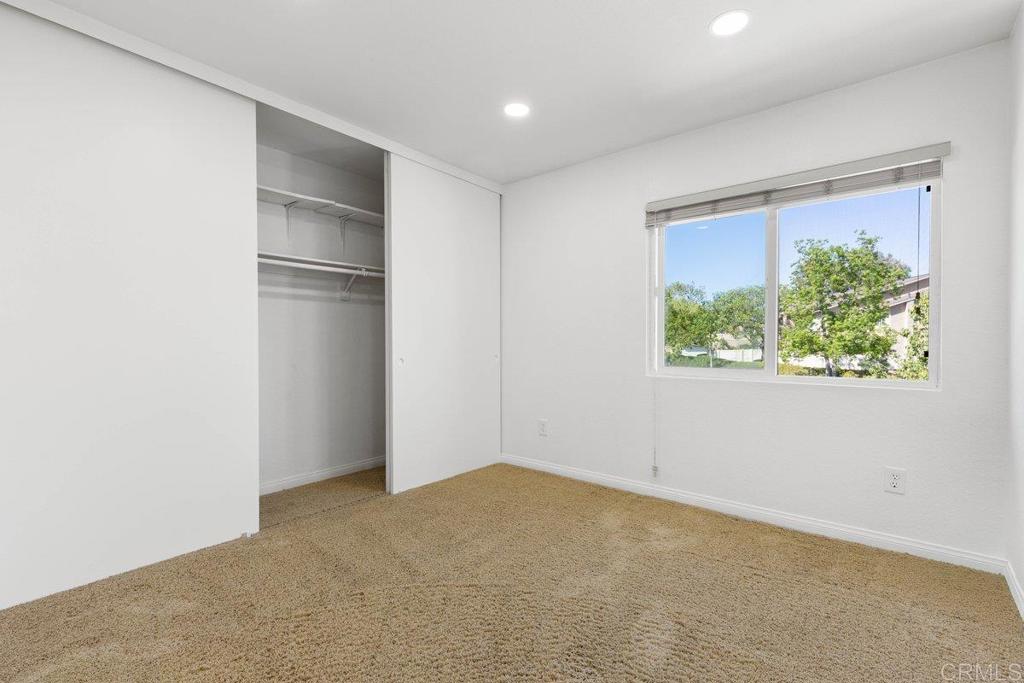 13544 Comuna Drive Poway, CA 92064 - Photo 22 of 41 an empty room with a window