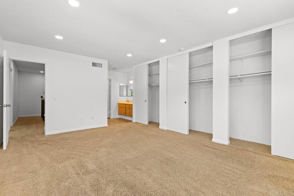 13544 Comuna Drive Poway, CA 92064 - Photo 25 of 41 a view of an empty room with a kitchen