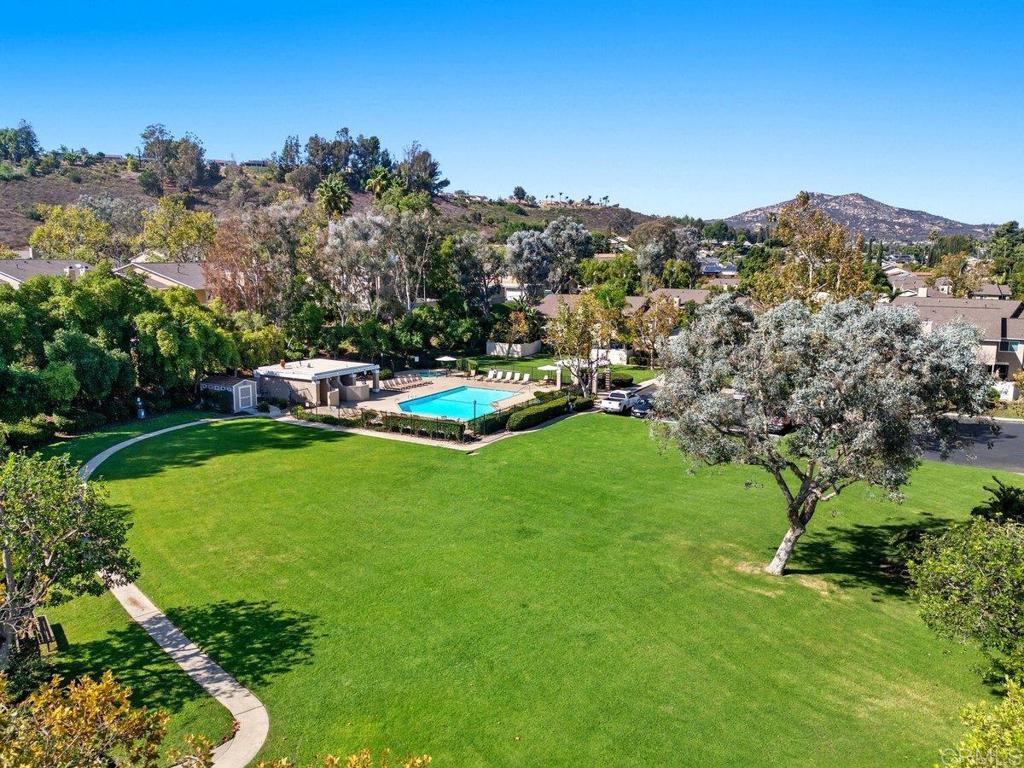 13544 Comuna Drive Poway, CA 92064 - Photo 3 of 41 a view of a golf course with a garden