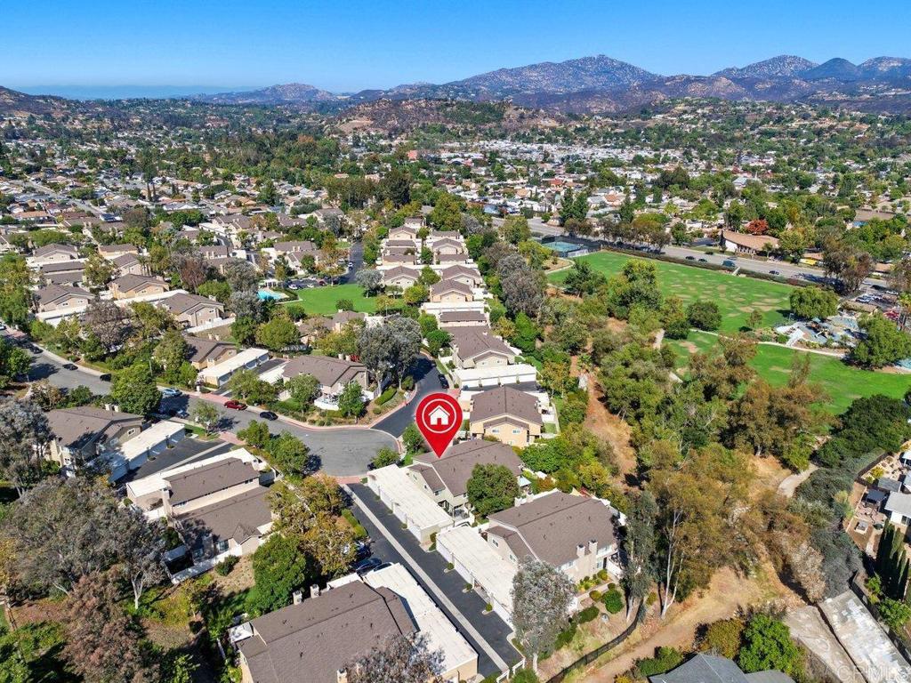 13544 Comuna Drive Poway, CA 92064 - Photo 37 of 41 an aerial view of a city with lots of residential buildings