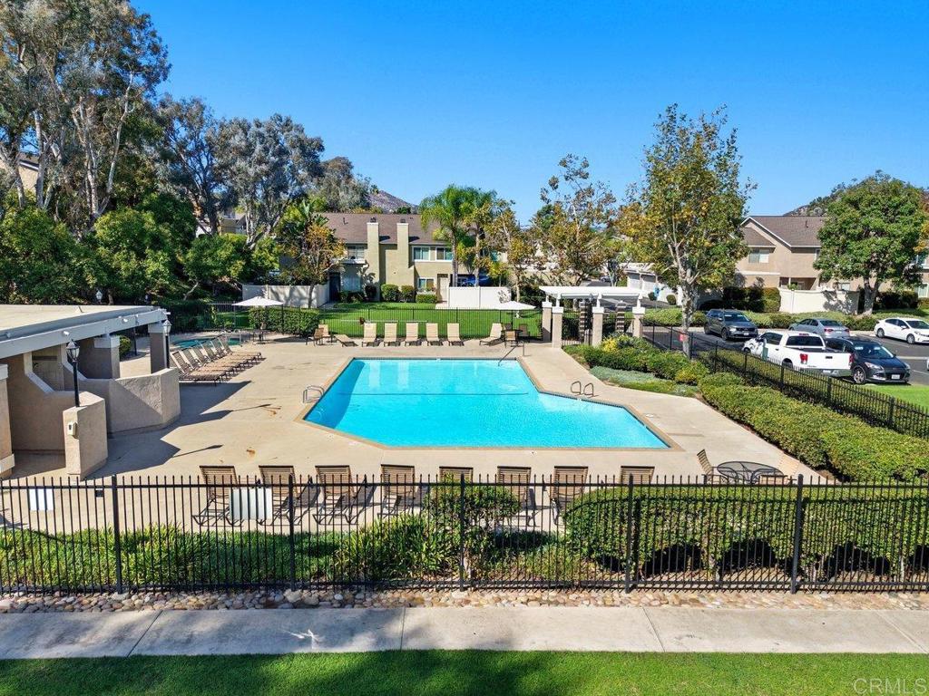 13544 Comuna Drive Poway, CA 92064 - Photo 4 of 41 a small garden covered with tall trees