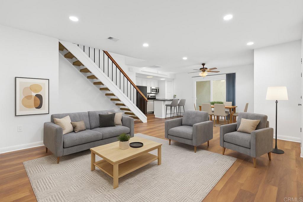 13544 Comuna Drive Poway, CA 92064 - Photo 6 of 41 a living room with furniture ceiling fan and wooden floor