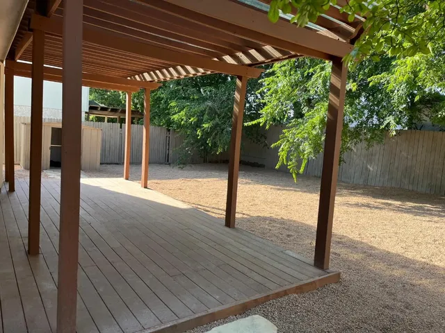 a view of backyard with green space