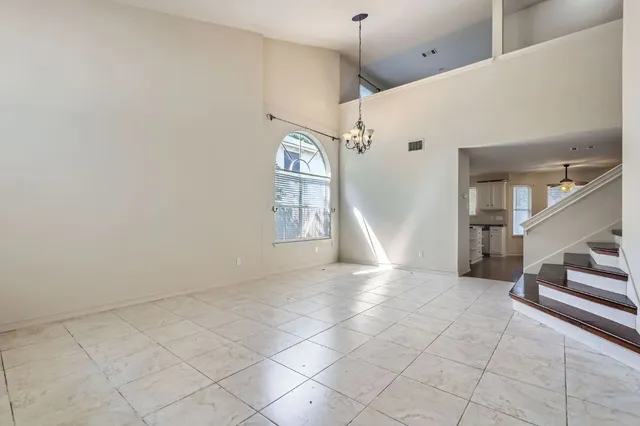 a view of entryway and hall with a window