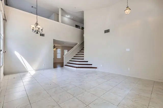 wooden floor in a room with a white walls