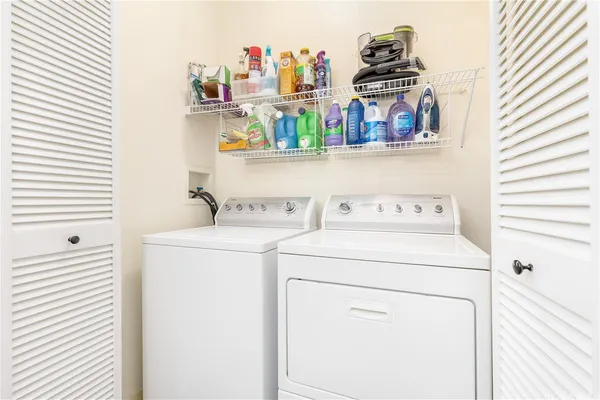 a utility room with dryer and washer