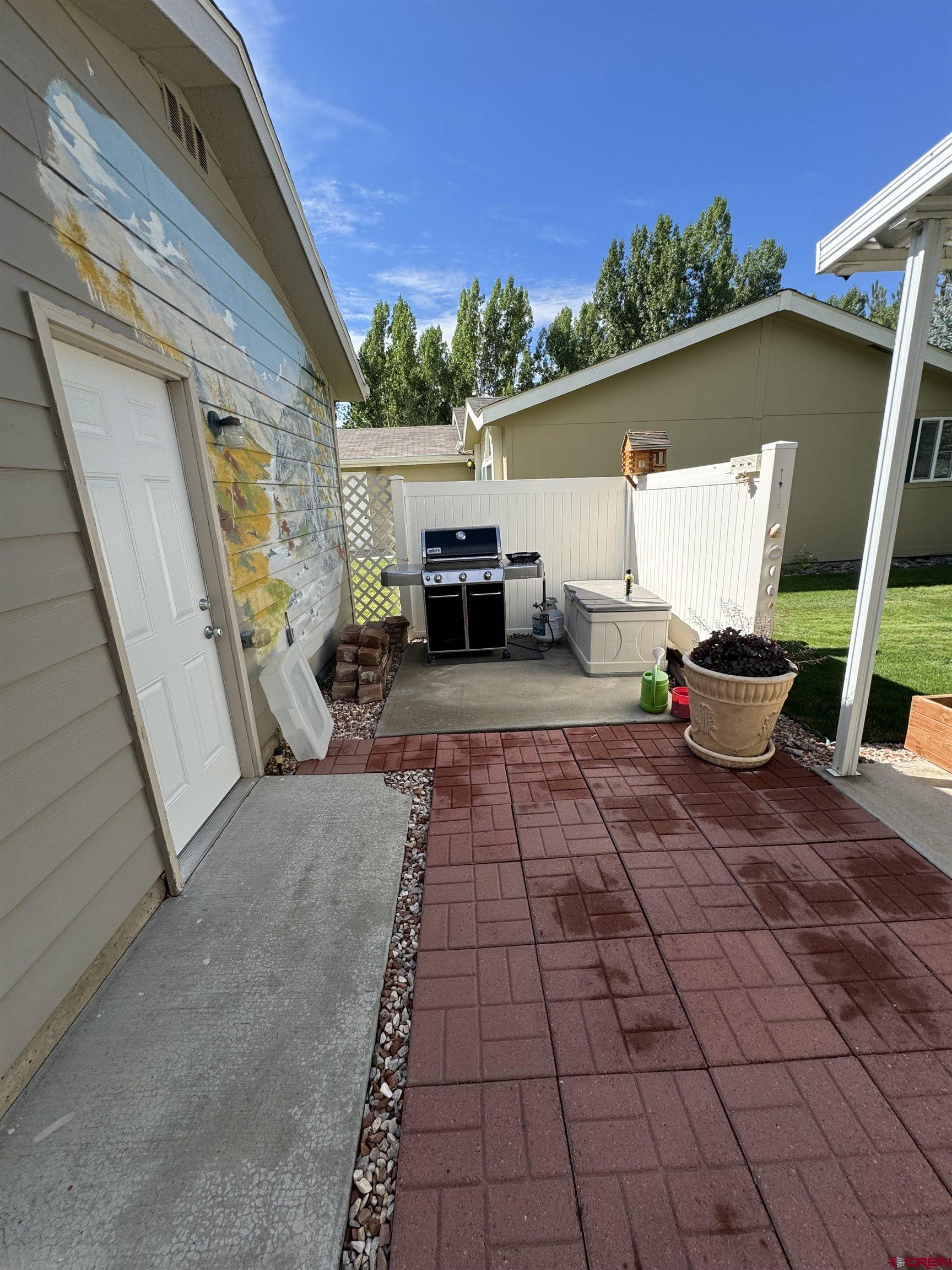 901 6530 Road, Unit 1307 Montrose, CO 81401 - Photo 12 of 14 a view of a porch with furniture