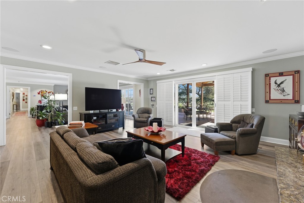 1805 Canyon Road Redlands, CA 92373 - Photo 15 of 61 a living room with furniture and a flat screen tv