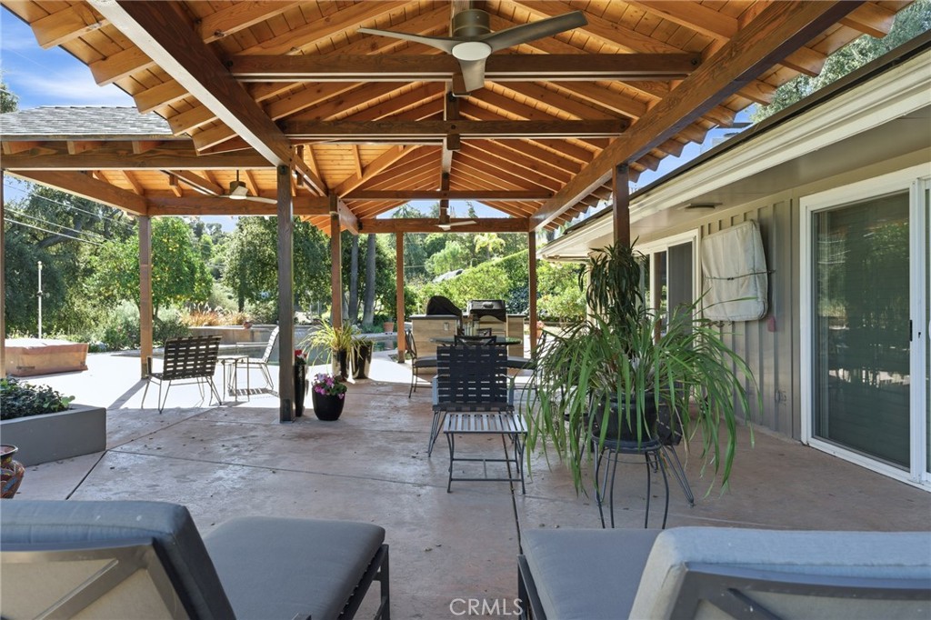 1805 Canyon Road Redlands, CA 92373 - Photo 4 of 61 a outdoor living space with patio furniture and potted plants