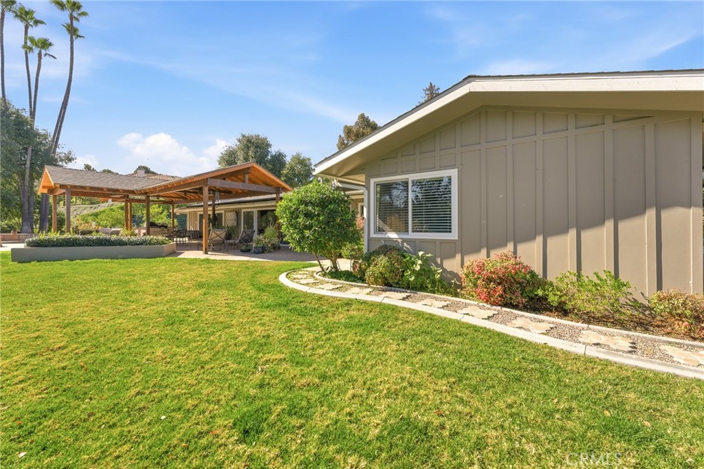 1805 Canyon Road Redlands, CA 92373 - Photo 49 of 61 a front view of house with yard and green space
