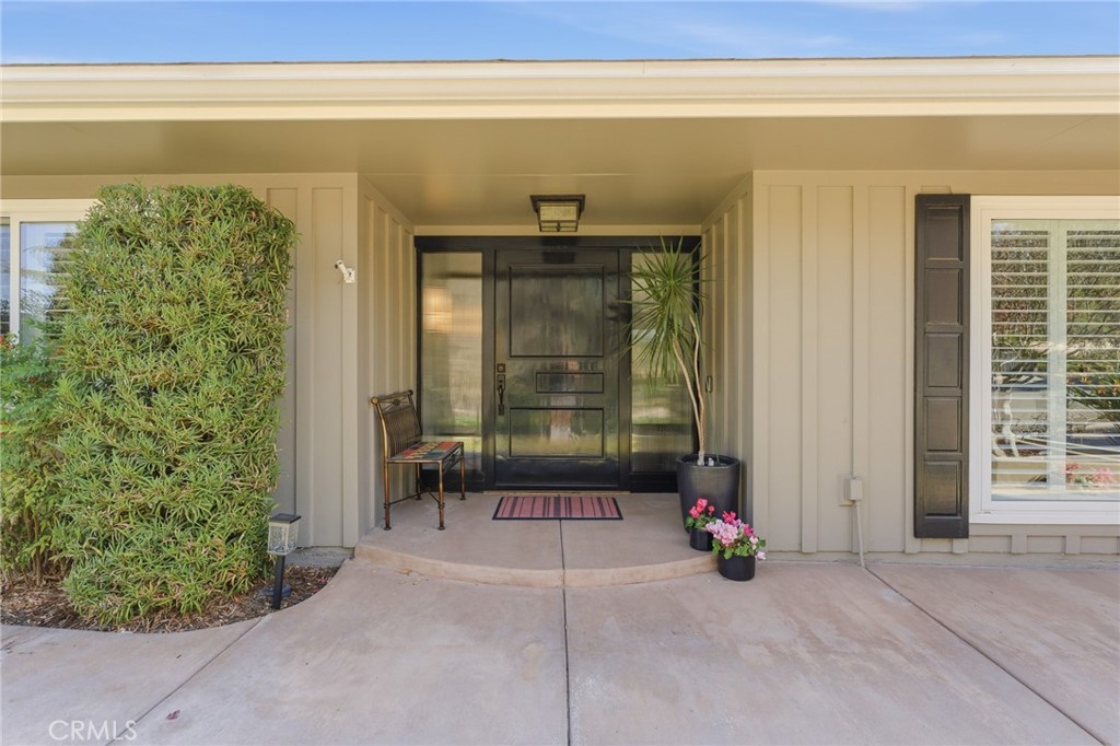 1805 Canyon Road Redlands, CA 92373 - Photo 5 of 61 a view of entryway with wooden floor and door