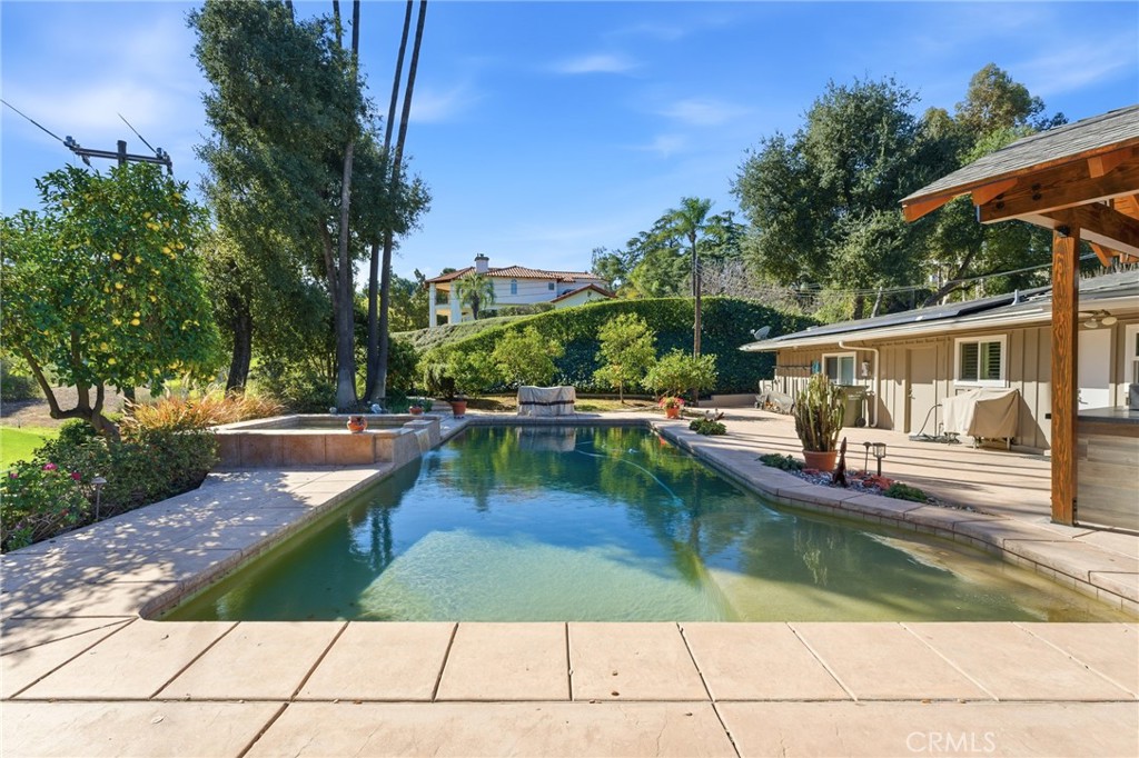 1805 Canyon Road Redlands, CA 92373 - Photo 51 of 61 a view of a swimming pool with a patio