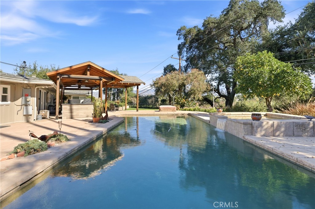 1805 Canyon Road Redlands, CA 92373 - Photo 53 of 61 a view of a lake with a house in the background