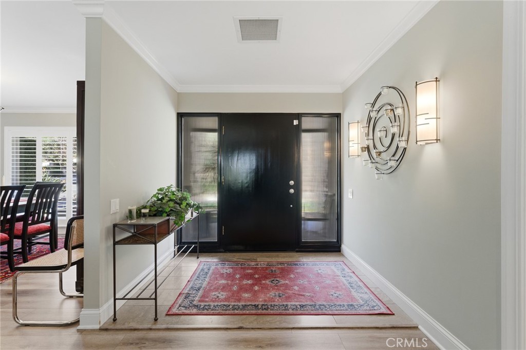 1805 Canyon Road Redlands, CA 92373 - Photo 6 of 61 a view of entryway with wooden floor
