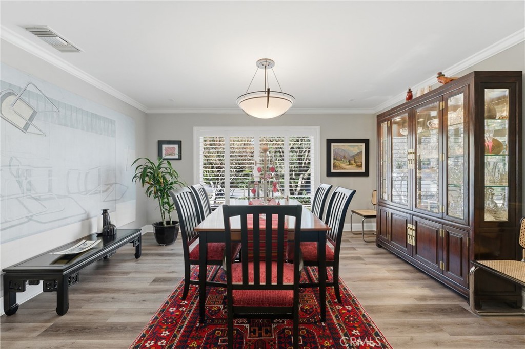 1805 Canyon Road Redlands, CA 92373 - Photo 9 of 61 a view of a dining room with furniture window and wooden floor
