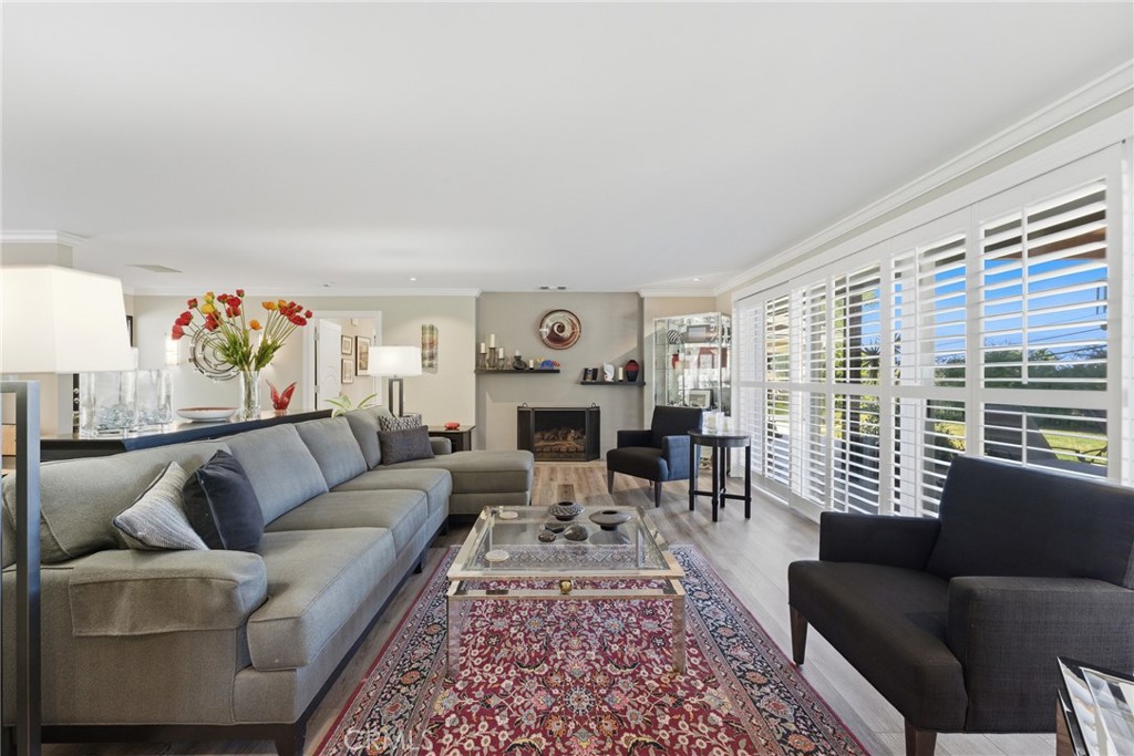 1805 Canyon Road Redlands, CA 92373 - Photo 10 of 61 a living room with furniture flower pot and a fireplace