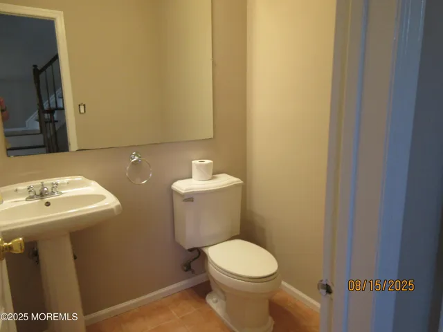 a bathroom with a sink and a toilet