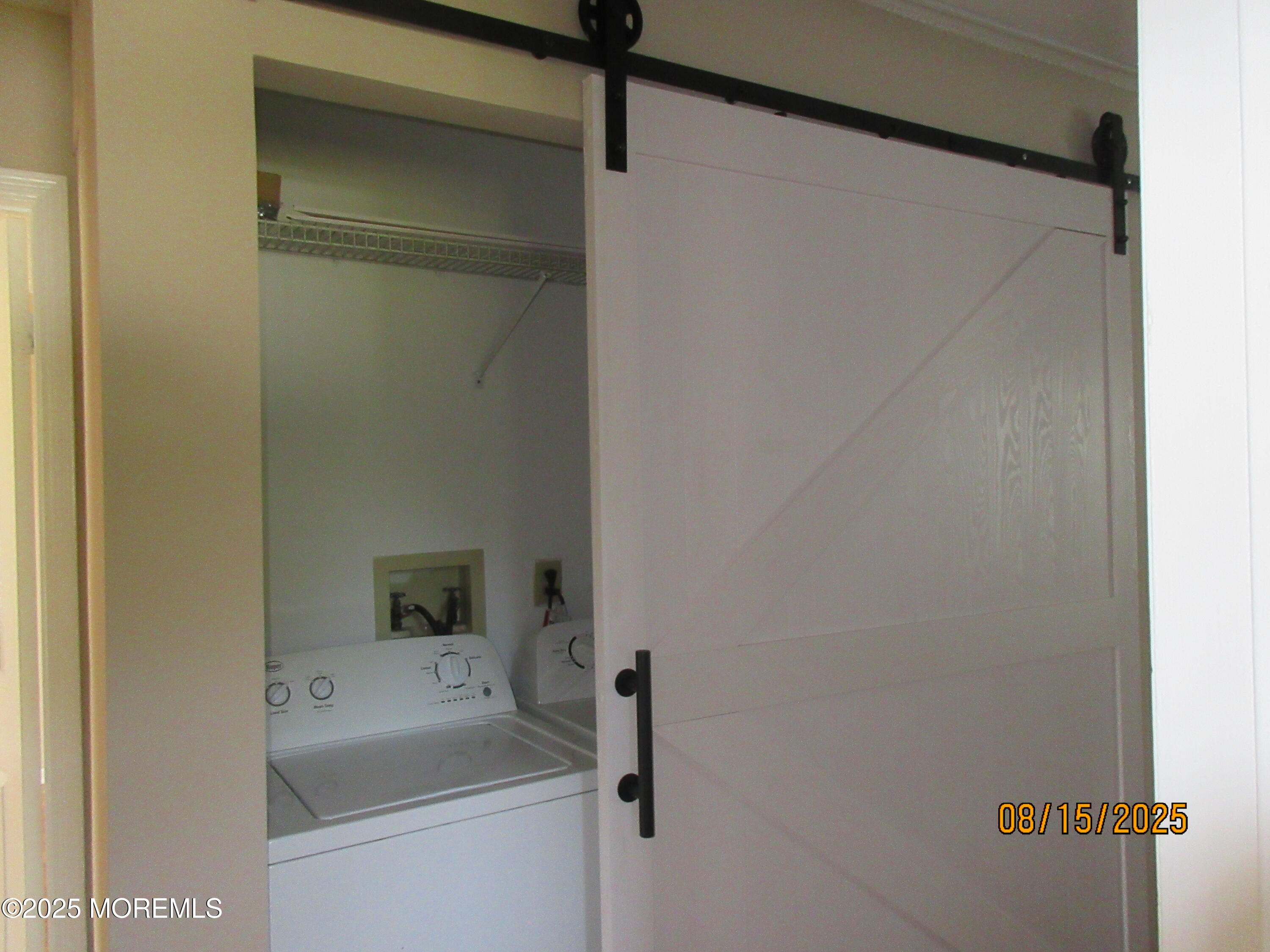 29 Longbrook Lane Freehold, NJ 07728 - Photo 14 of 40 a bathroom with a sink and mirror