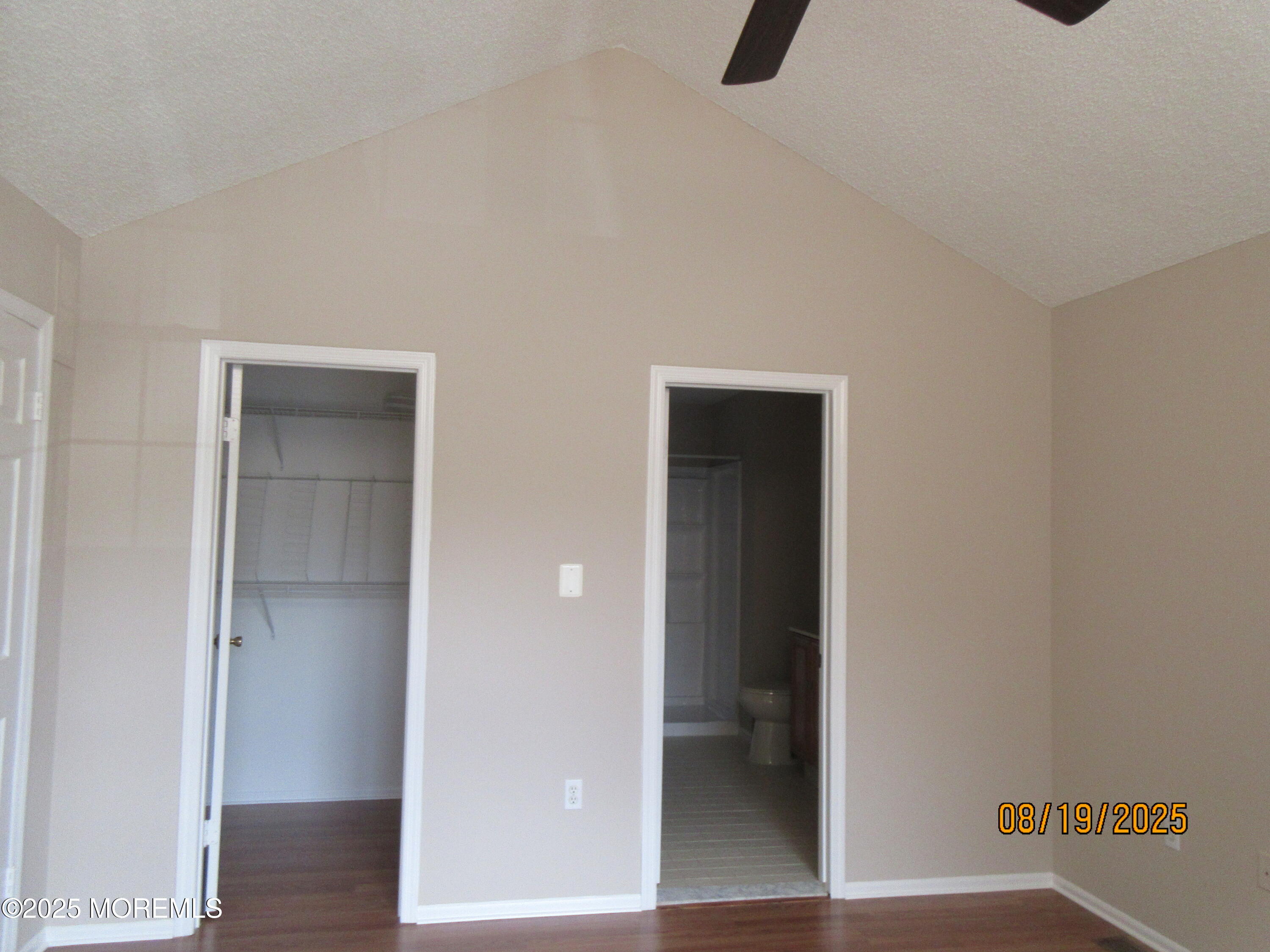 29 Longbrook Lane Freehold, NJ 07728 - Photo 18 of 40 a view of an empty room with wooden floor and closet