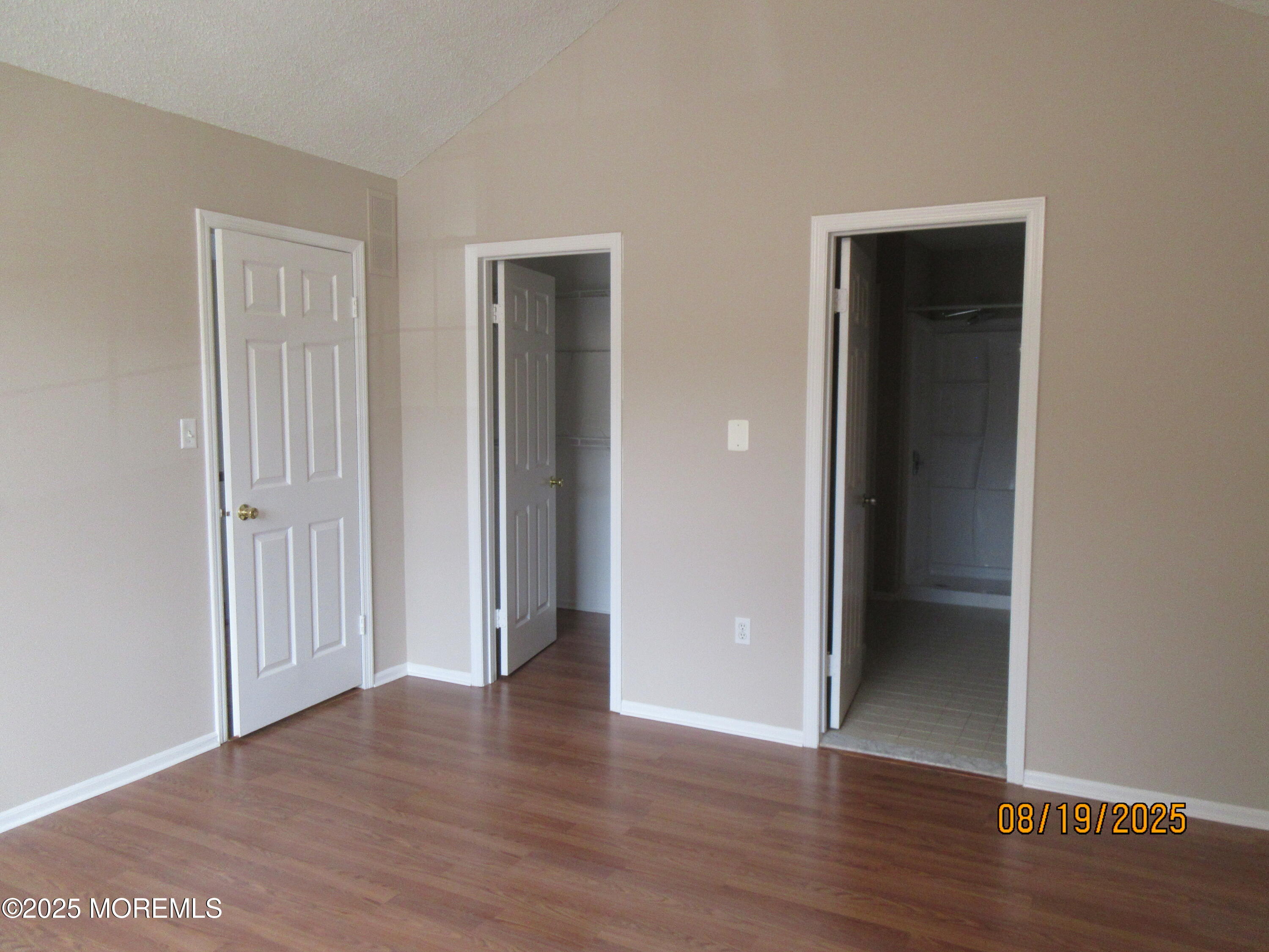 29 Longbrook Lane Freehold, NJ 07728 - Photo 19 of 40 an empty room with wooden floor and closet