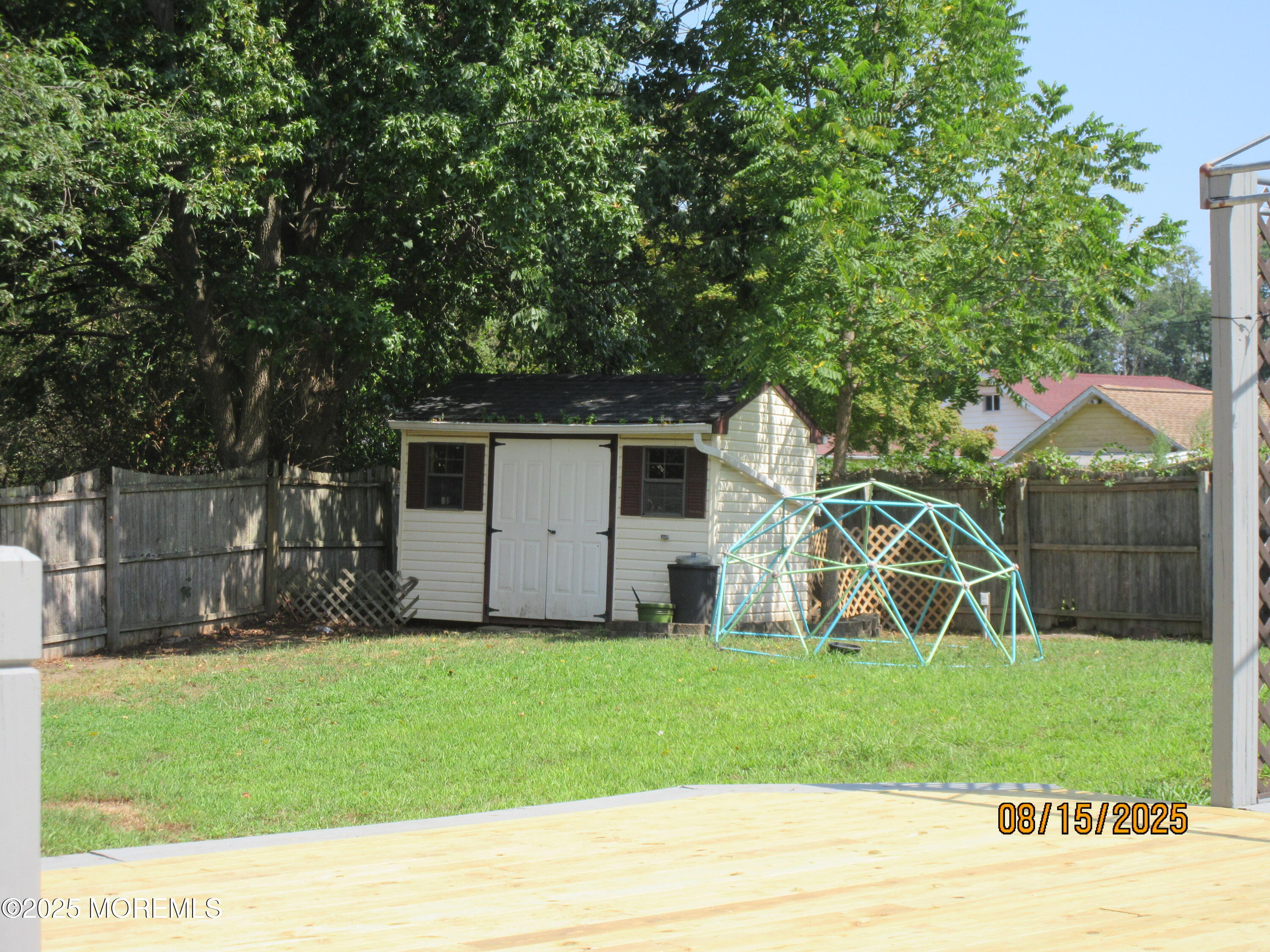 29 Longbrook Lane Freehold, NJ 07728 - Photo 35 of 40 a view of a house with a backyard