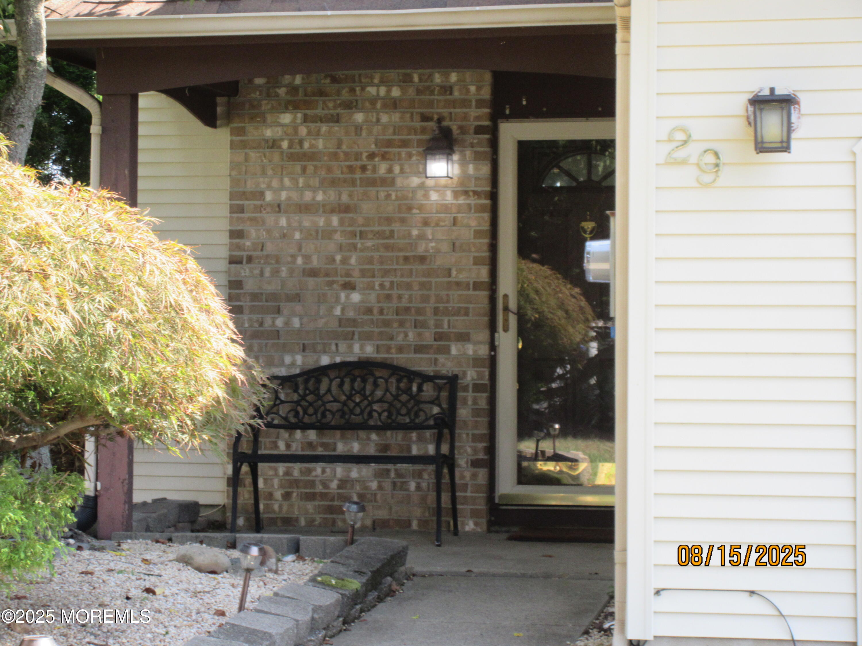 29 Longbrook Lane Freehold, NJ 07728 - Photo 38 of 40 a front view of a house with a glass door
