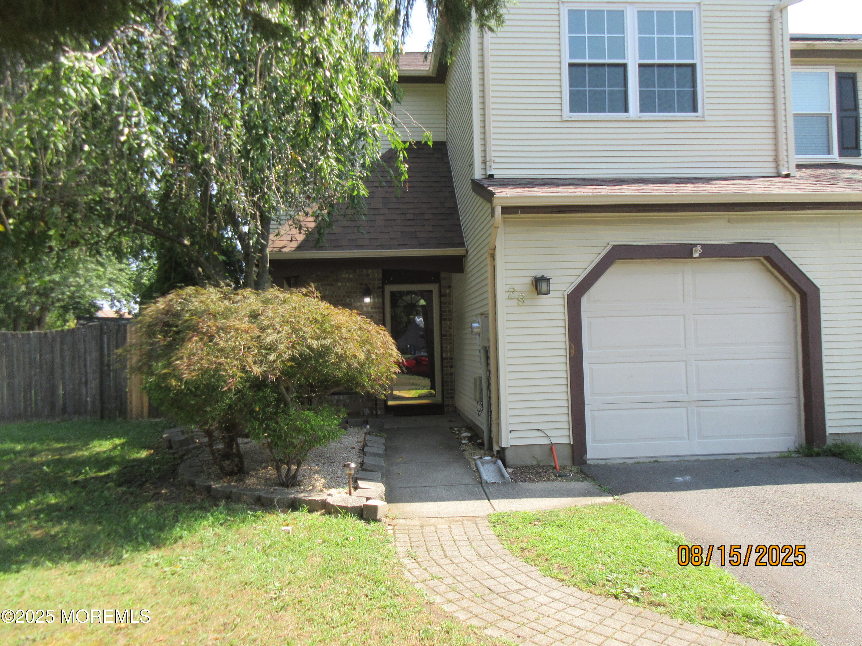29 Longbrook Lane Freehold, NJ 07728 - Photo 39 of 40 a front view of a house with garden