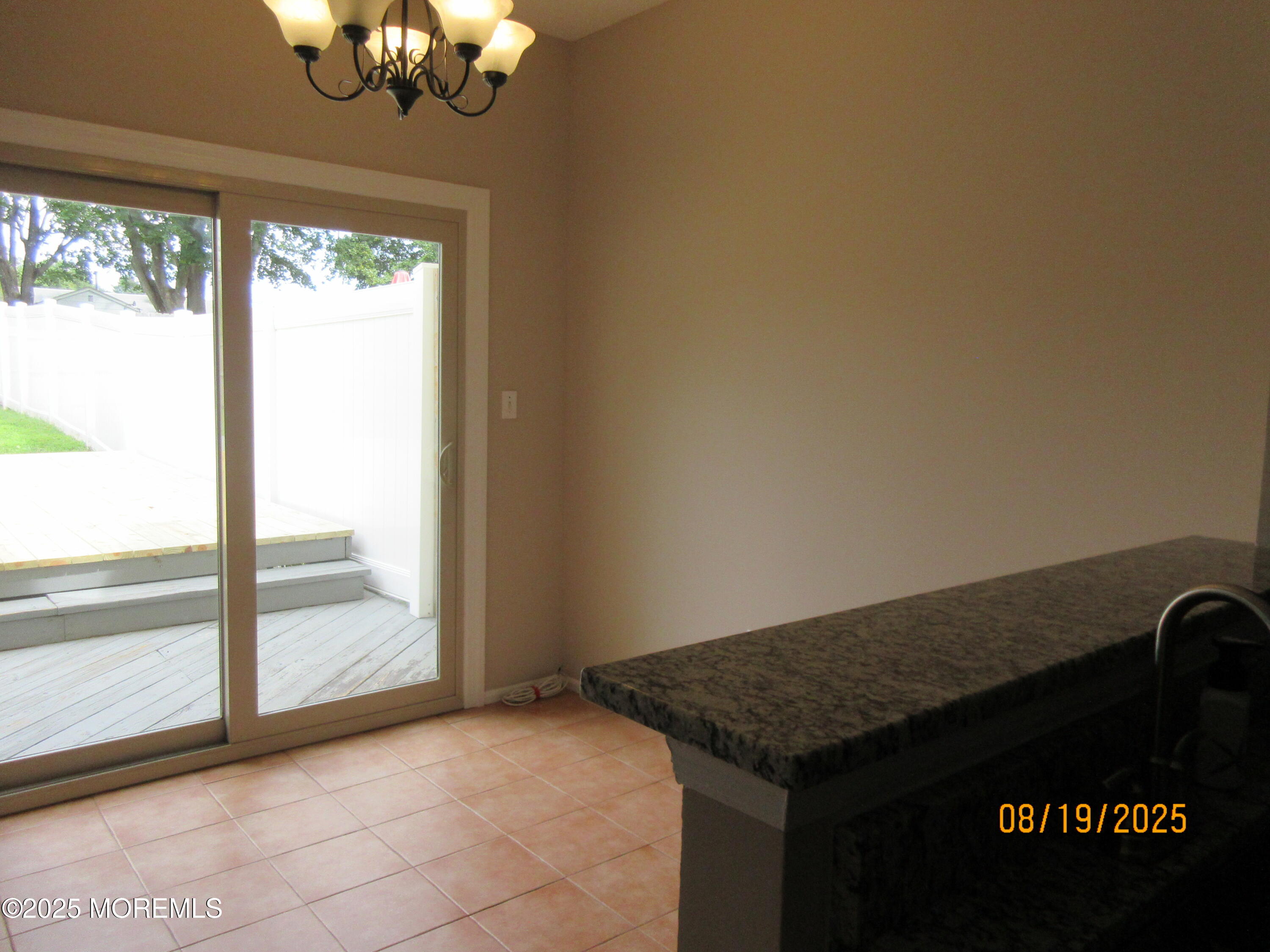 29 Longbrook Lane Freehold, NJ 07728 - Photo 9 of 40 a view of a livingroom with wooden floor and a large window